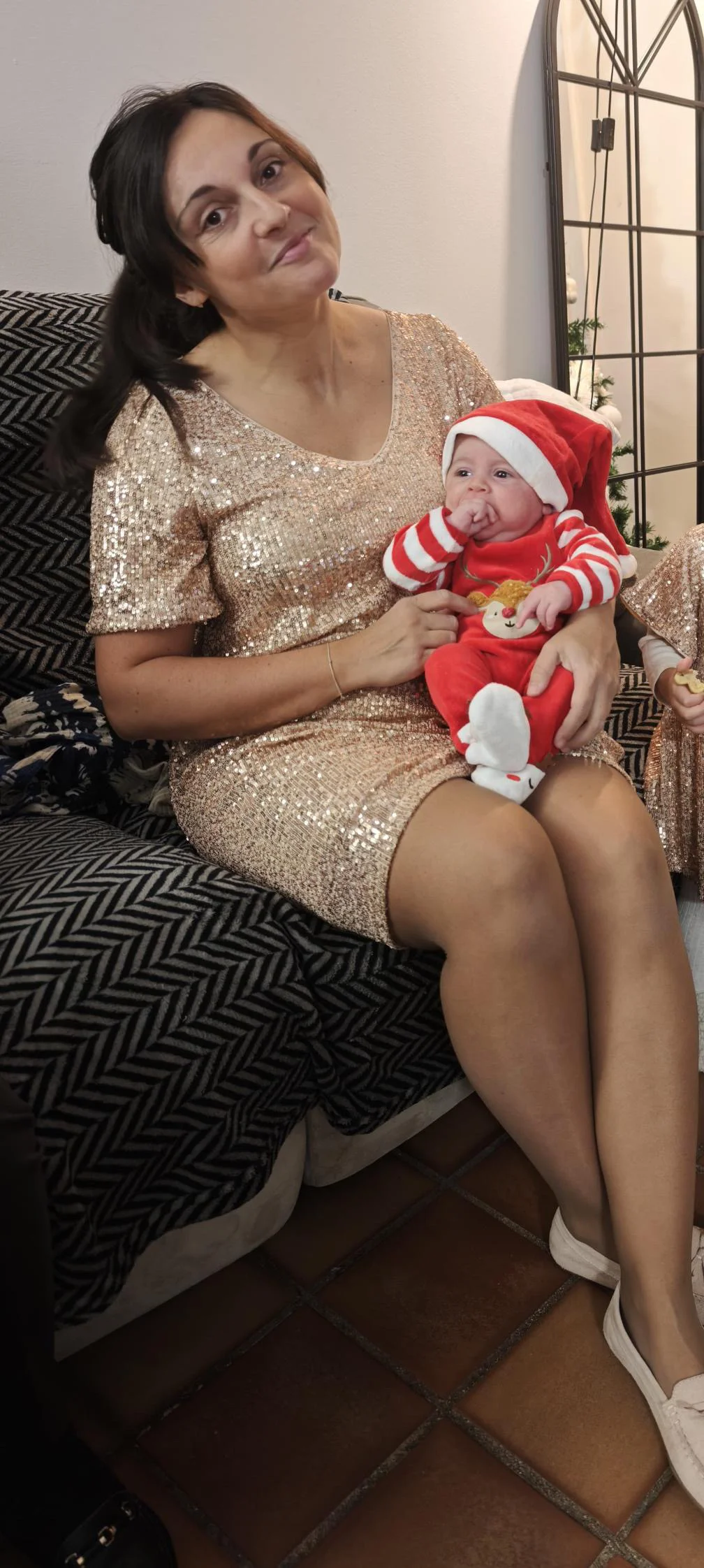 Marion avant, avec son bébé dans les bras